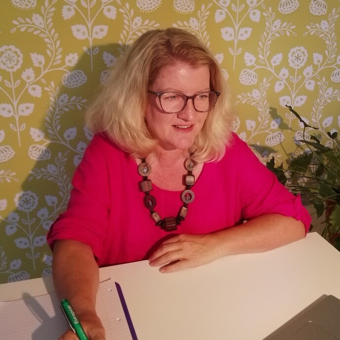 Dr Rachel Davies at desk