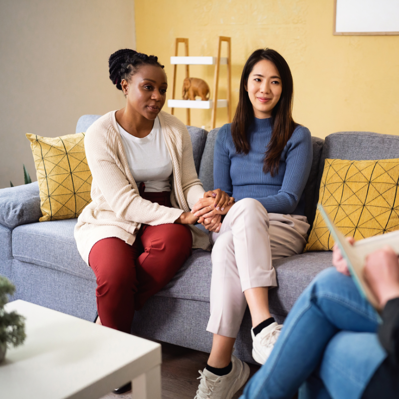 Couple sitting on therapist's couch
